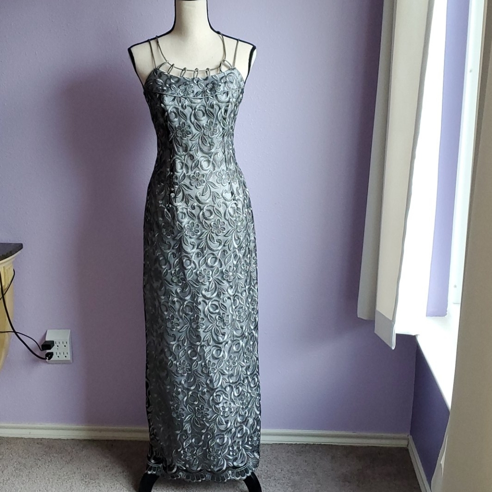 Silver evening dress with shoulder wrap